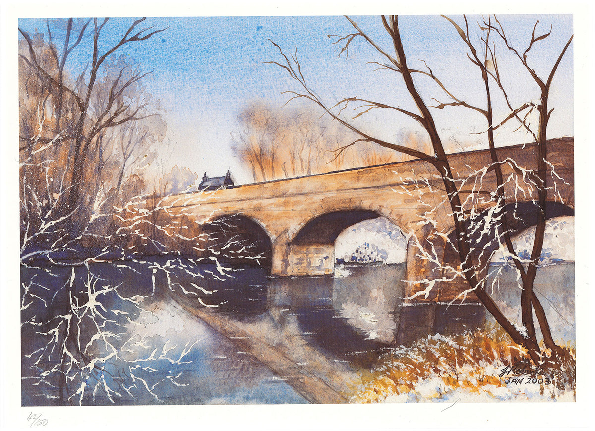 "Winter Tyne Bridge" is a stunning lithographic reproduction of an original watercolour by artist Joanne Roberts. Inspired by a brisk, early morning walk along the riverside, this piece beautifully captures the snow-dusted Tyne Bridge and the historic old toll house as it crosses the North Tyne River at Bellingham. Print Size 15" W x 10.5" H