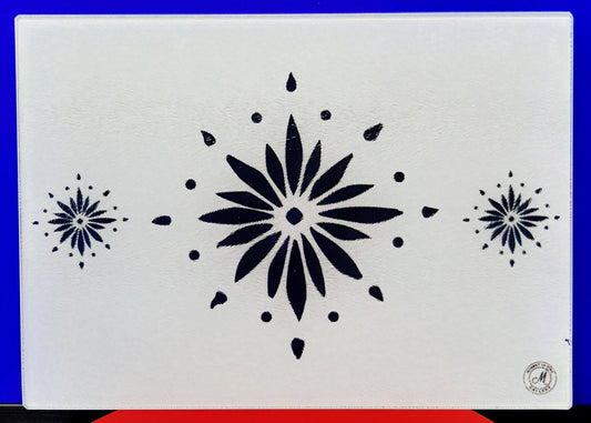 Table mat with decorative blue flowerburst design on a white background. Heat resistant place mats.