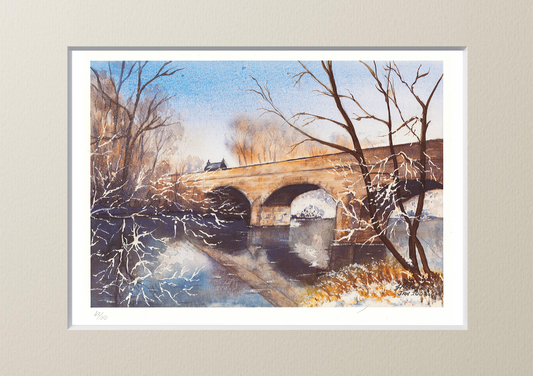 "Winter Tyne Bridge" is a stunning lithographic reproduction of an original watercolour by artist Joanne Roberts. Inspired by a brisk, early morning walk along the riverside, this piece beautifully captures the snow-dusted Tyne Bridge and the historic old toll house as it crosses the North Tyne River at Bellingham. Print Size 15" W x 10.5" H with 2" Cream Mount.