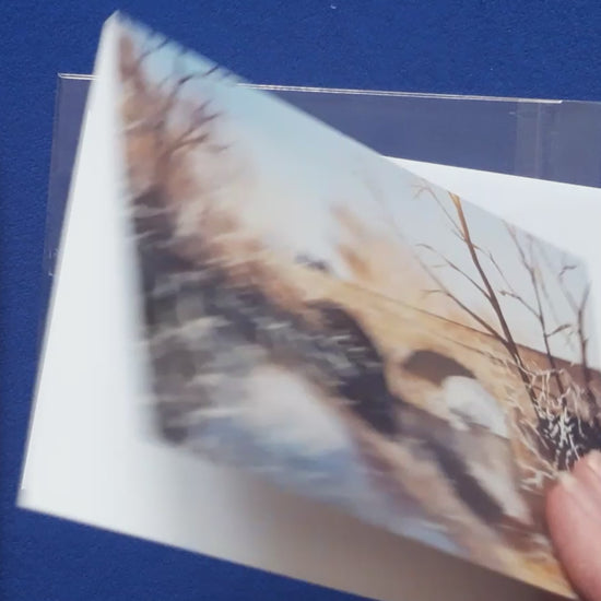 Video of card
Christmas Card, Winter Tyne Bridge
Print of an original watercolour artwork by Joanne Roberts,  Reflective winter view of the Tyne Bridge in Bellingham, in Northumberland, UK.  Single card, folded horizontally on the top, includes white envelope and cello packaging. Blank inside for your personal messages and memories to be added. Size 5 x 7 inch