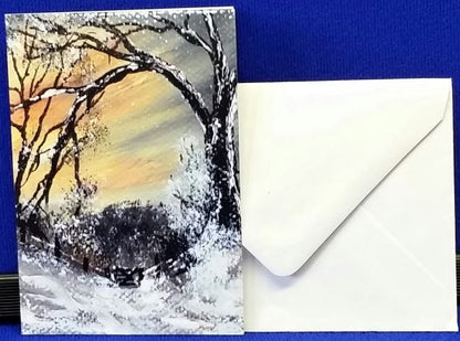 Christmas Gift Cards - Winter Linn Gate 2
Print of an original artwork by Joanne Roberts, View of a winter woodland walk with the kissing gate ahead to walk through. Single packs of 6 cards, folded vertically on the left, includes white envelope and cello packaging. Blank inside for your personal messages and memories to be added. Small cards